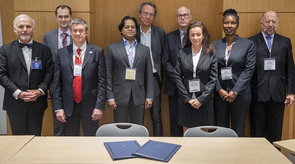Representatives from the IBA and the FAO at the signing of the Agreement